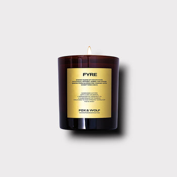 Vegan luxury Fyre scented candle with smoky, earthy, and woody notes.