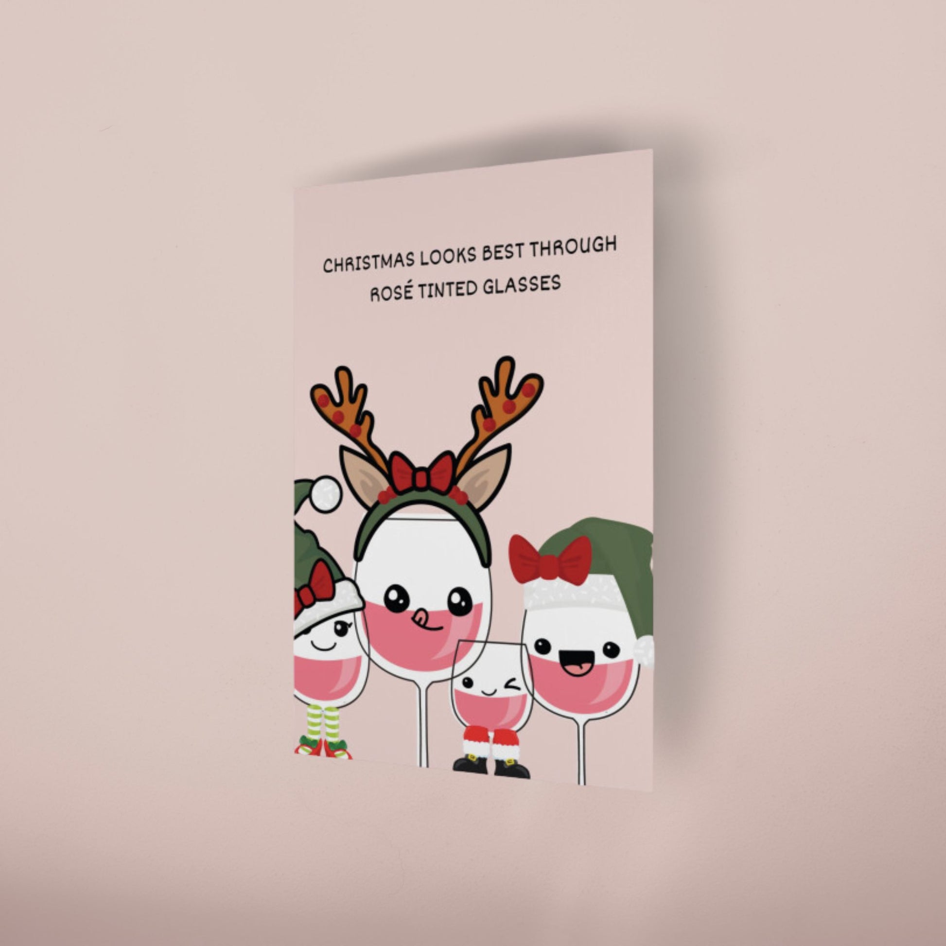 'CHRISTMAS LOOKS BEST THROUGH ROSÉ TINTED GLASSES' CHRISTMAS CARD